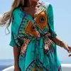 Robes décontractées Femmes Maxi Robe Fashion Print V Neck Summer Summer Beach Style High Split Large Hem Lace-Up Boho Beachwear