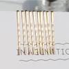 Cabelos clipes vintage cor de ouro ondulada