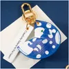 Anahtarlıklar kordonlar moda araba anahtarlık çantası cazibesi klasik l mektup anahtar zincir cüzdan tasarımcısı kadınlar için enfes coupl dhr72