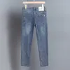 Hösten 2023 Produkt Jeans Mens Slim Fit Small Straight Ben Fashion Märke Mångsidiga elastiska byxor High End European varor