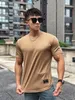 Homens de verão Manga curta camiseta de ginástica esportiva de ginástica Sport Gym Muscle Trefinet Casual Tops de alta qualidade Roupas 240428