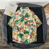 Vintage Blumen kurzärmelige Männer Urlaub Strand Hawaiian Shirt Fashion Casual Lose Button Printed Sun Protection Clothing Tops 240428
