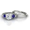 Anillos de boda 2pcs/set sier color 6 garra blanca azul circón anillo de novia Juego de mujeres mujeres elegantes noches de noche joyas de joyería del dhwxd