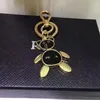 Luxurys Key Chain Designer Keeschains Lettres Bear Keychain Femmes boucle bijoux Sacs de cuites pendentifs Couple de charme