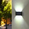 Dekorationer 10 LED Solar Ambient Wall Lamp utomhus Vattentät soldriven ljus upp och ner belyser hemträdgårdsverandens trädgårdsdekoration