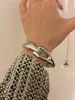 Huanzhi in metallo vuoto irregolare liscio Bracciale di bracciale grosso per donne esagerate gioielli per feste di lusso punk per la moda esagerata 240423