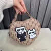 Vrouwenontwerpertas 2024 Nieuwe cartoon hartvormige modieuze modieuze trendy ketting enkele schouder crossbody tassen trendy tassen