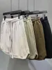Shorts femininos espelhos de rowling de cor sólida versátil bolsos de verão casuais calças vintage aconchegantes 2024