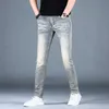 Printemps 2023 Jeans masculins minces pour hommes pour édition coréenne élastique élastique polyvalente slim slim small pieds pantalons hommes