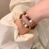 Bracelet perlé bodhi de style chinois pour femmes perles de bouddha à la main attirent des bracelets de coffre-fort chanceux et de bijoux d'anniversaire cadeau