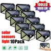 Dekoracje 1 ~ 10pcs 100 LED Solar Wall Lights Outdoor Solar Lampa Wodoodporna Motor Słoneczny Słoneczny światło słoneczne Street Light Ogród Wystrój ogrodu
