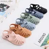 Sandales Summer Childrens Sandales bébé filles doux non glissement princesse chaussures pour enfants bonbons jelly plage chaussures garçons décontractés slippersl240429 décontractés