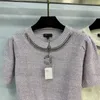 Mode kvinnors tröja designer tidigt på våren ny akademi vind tung bransch paljett tråd midja samling kort stickad kortärmad topp