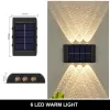 Decoraties LED Solar Lamp Outdoor Waterdichte wandlampen voor tuinwerf Decor landschapslampen op en neer lichelachtige verlichting zonlicht licht