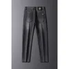 Fine jeans neri autunnali alto per maschi versione coreana slim fit piccoli piedi di altezza stretta elastica pantaloni casual e versatili