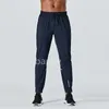 Designer långa byxor män sport springa anpassa yoga utomhus gym fickor smala passform tröjor pant jogger byxor mens casual elastic midje gym sportig