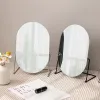 回転する楕円形のメイクミロウメタルスタンディングミラーバスルームデスクスタンディング韓国の美容鏡壁画家の寝室の装飾