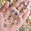 100PCs Wholesale Random Mixed Alloy 3D Bulk Figures for Nails Fashion on Sale Nail Art Glass Beads Rhinestones Charms Butterfly 240415