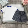 Fashion Baby Tracksuits Sommeranzüge Kinder Designer Kleidung Größe 100-150 cm Dinosaurier Stickt-Shirt und Buchstaben gedruckte Shorts 24APRIL