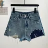 Dżinsy dżinsowe dżinsowe szorty damskie jasnoniebieskie wysokie talie z luźnymi luźnymi otworami i frędzlami letnie seksowne spodnie