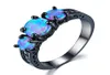 Exquisite Runde drei Steinringe Blau Feuer Opal Fashion Ring Schwarz Gold gefüllt Eheringe für Frauen Vintage Schmuck AB149311555914