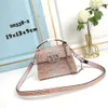One Cowhide Valenttiino lady Classic New Fashion Leather Chain Miniloco Little Handheld Womens Bags Leather Vbuckle Straddle shoulder Metal V Purse Bag Lady JYXE