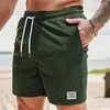 Mäns shorts män beskurna byxor sommaren corduroy med elastisk dragkamp i midjan fickor solid färg rak bredben streetwear