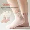 Chaussettes féminines 2024 printemps et été un maillage des filles en coton est légèrement respirant arc floral peigné des enfants