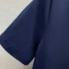 Basic casual jurken Designer Triangle Decoratieve knop Deur Guard slanke pasvorm en afslanke zijsplit Polo nek Korte mouw Flip Neck jurk