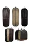 Förvaringspåsar 1pc kostym dammtäcke bärbar rese affärsfoldning hängande plaggväska för hemhushållskläderskydd AC4140355