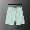 Camicia a manica corta stampata geometrica Shorts Shorts Suit tracce per uomini Summer Hawaii Abiti set da due pezzi Pantaloni per camicetta set A26