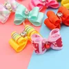 Coiffe de vêtements pour chiens Bows Cat Coups faits à la main avec un élastique Produits de chiot de chiot accessoires petits chiens