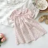Vêtements d'enfants coréens filles robes à manches courtes imprimées fleur robe décontractée pour les vêtements d'été pour enfants Douces filles robe princesse 240504
