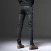 Designer Jeans for Man Black distressed jeans men's trendy slim fit small feet autumn new trend scraped trendy version versatile long pants for men