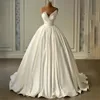화려한 웨딩 드레스 2024 Princess Ball Gown V-Neck Beads Pearls Satin Lace Up Dubai Bridal Gowns Robe de Mariee