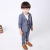 Teenage Children's Clothing Boys Korean Suit Children Plaid Pak Waistcoat Jurk vierkoppige set (jas + vest + shirt + broek) en een cadeau-vlinderdas