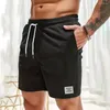 Mäns shorts män beskurna byxor sommaren corduroy med elastisk dragkamp i midjan fickor solid färg rak bredben streetwear