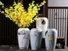 Vases China Blanc Porcelaine Lotus Bloom Vase en céramique pour la décoration intérieure Plant Hydroponic Plant6873192