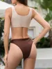 Kvinnors badkläder 2024 Ring Länkad monokini Cut-Out One Piece Swimsuit Kvinnor ihåliga ut sexiga kvinnliga strandkläder badbad baddräkt
