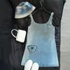 基本的なカジュアルドレスデザイナー23初秋のジッパートライアングルバッグ勾配洗浄デニムサスペンダードレスクリーンスモールバージョンストラップスカートフォスト