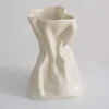 Vases Simple Cream Ceramic Decoration séchée Vase Flower Vase salon Bureau en ligne Célébrité High Sense Art Ornements.