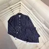 Dames Tracksuits Designer Brand Spring/Summer Nieuwe PRA High -setting Casual Style Stripe Gedrukt Polo Neck Shirt+Elastische taille Slanke shorts Set Gul5