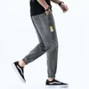 Letnie dżinsy męskie Jogger cienki harem spodnie bawełniane spodni w stylu Korea w stylu jasnoniebieskie stóp belki hip -hopowej