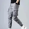 Autumn Men Pants Hip Hop Harem Joggers Pants Mane Trousers Mens Mens Solid Multi-Pocket Cargo Pants Skinny Fit Sweatpants 240429