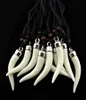 Whole Mixed 12pcs Imitation Yak Bone Wolf Tooth Pendant Necklace Acrylic Elephant Teeth Amulet Necklace Men Women039s Jewel6897727