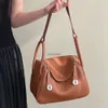 100% authentique en cuir Docteur Sac à épaule de luxe Designer de marque Litchi Match 26cm 30cm Vache douce pour femmes Taptes Dumpling Golds et sacs à main