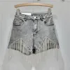 Kvinnors shorts Tassel Chain Denim Summer 2024 Hög midja bantning Sexig europeisk och amerikansk stil tung industri