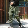 2024 pantaloni da uomo della moda da uomo hip hop hip hop color tasche più tasche pantaloni sportivi streetwear 240429