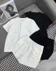 Dames tracksuits Designer Brand Letter Pocket Print Set 24 Lente/zomer Nieuwe Round Neck Short Sleved T-shirt Top+Elastische taille Shorts Tweedel Pie