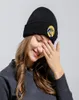 Uma orelha patch face chapeaux laine femme lettre pendante pnemateuse de marque taillée